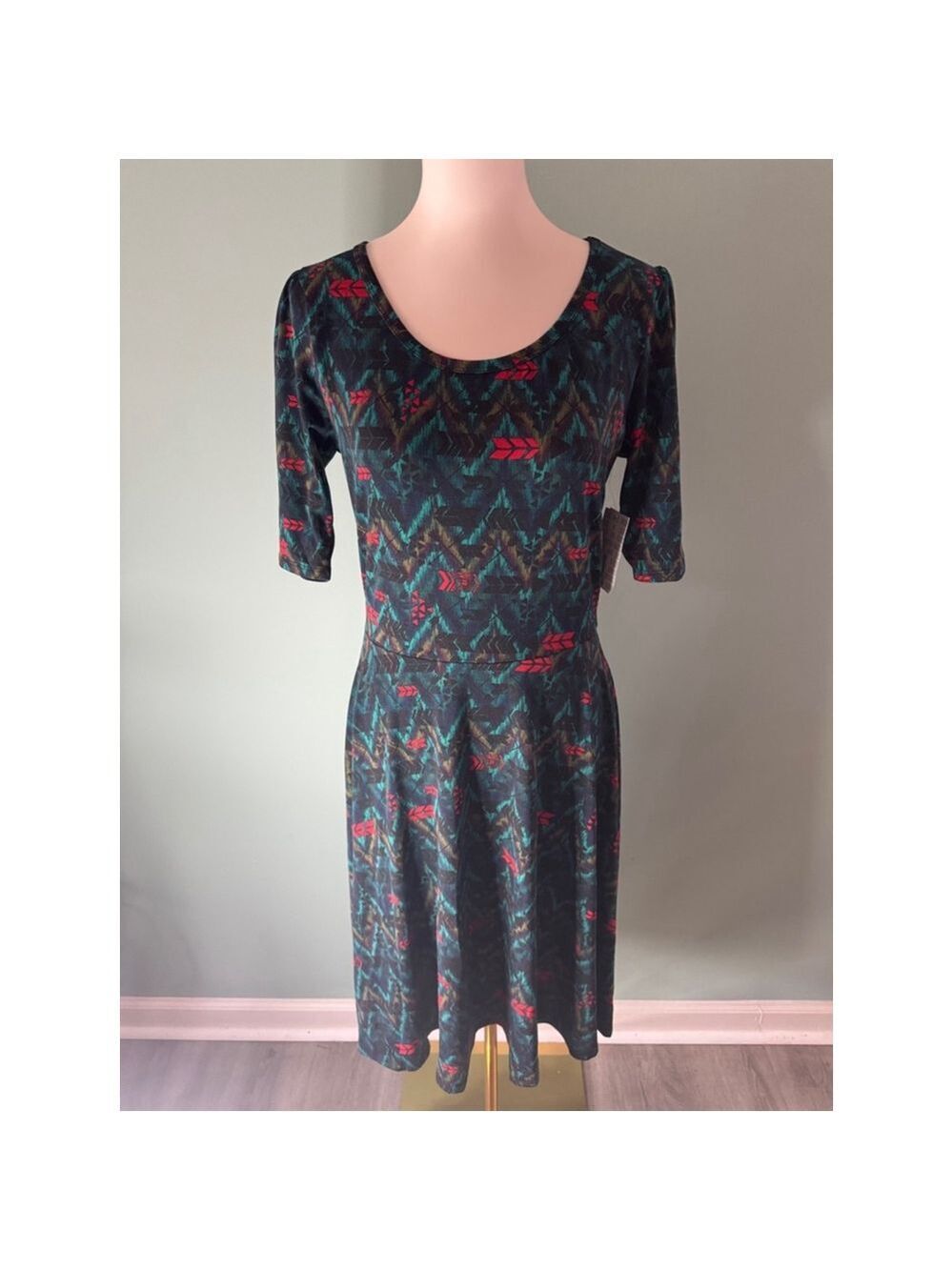 Women's LuLaRoe Nicole Dress Size L Black Teal Arrow Print